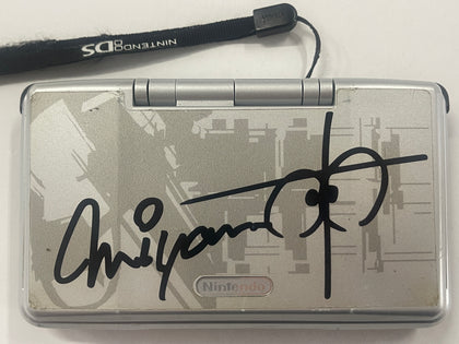 Original Silver Nintendo DS with Nintendo Official Shigeru Miyamoto Signature Decal