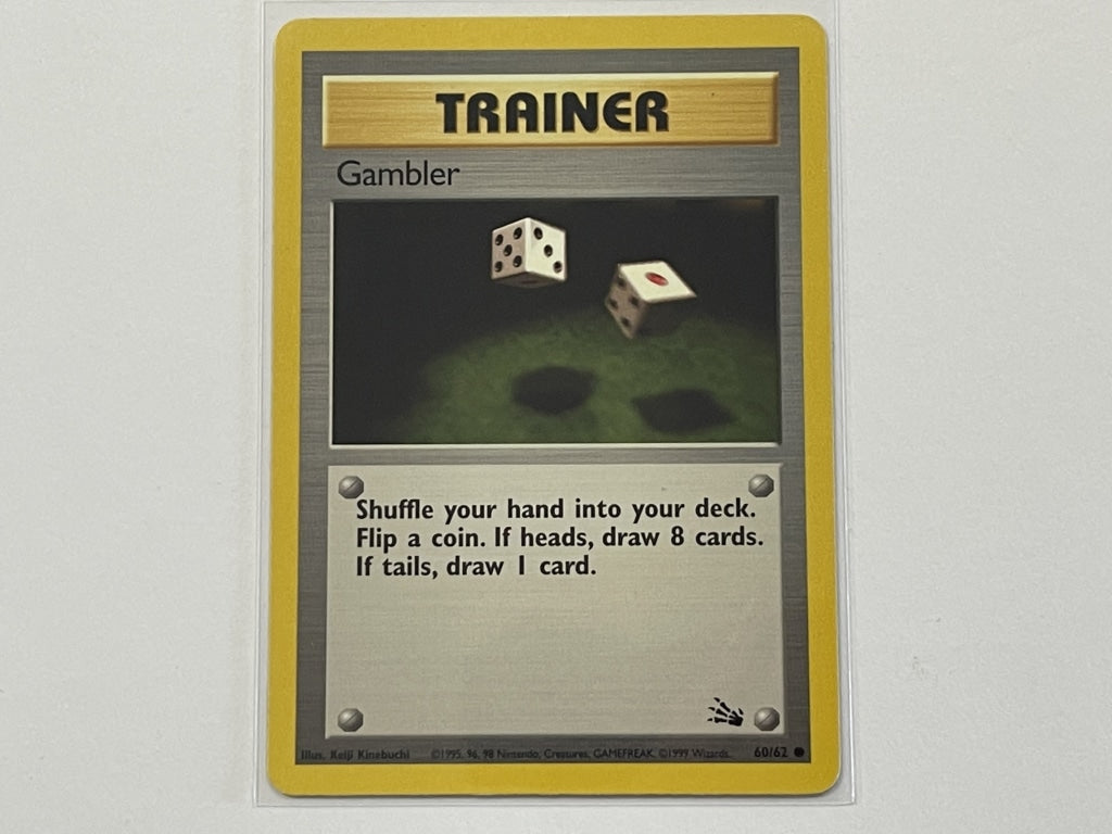Trainer Gambler 60/62 Fossil Set Pokemon TCG Card In Protective Penny The Game Experts Trainer Gambler 60/62 Fossil Set Pokemon TCG Card In Protective Penny The Game Experts