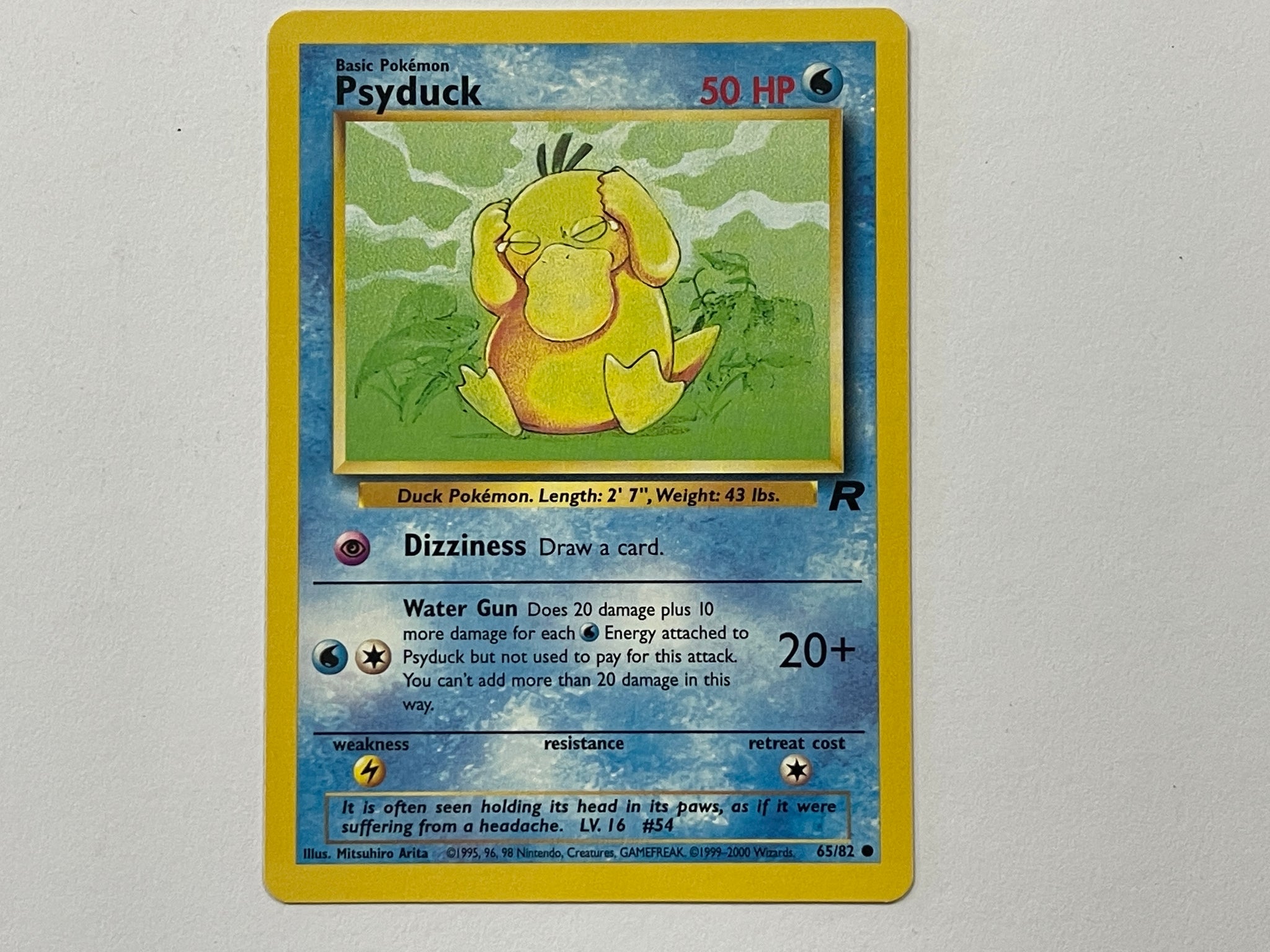 Psyduck 65/82 Team Rocket Set Pokemon TCG Card In Protective Penny Sle The Game Experts Psyduck 65/82 Team Rocket Set Pokemon TCG Card In Protective Penny Sle The Game Experts