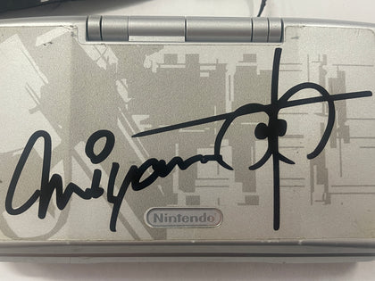 Original Silver Nintendo DS with Nintendo Official Shigeru Miyamoto Signature Decal